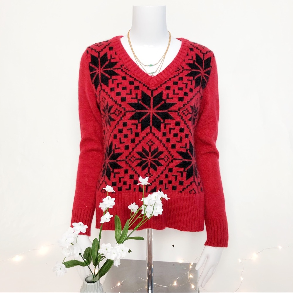 Red sweater with geometric design